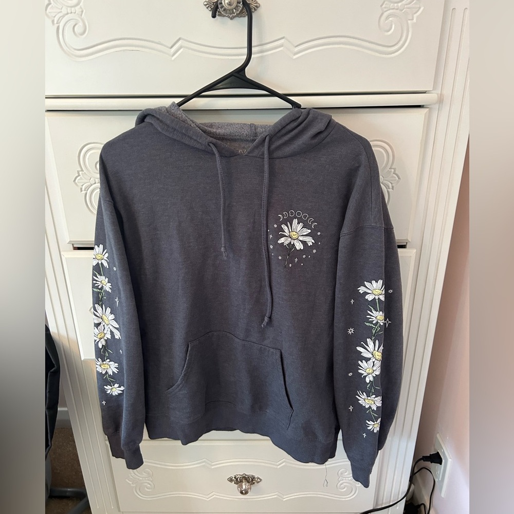 grey sweatshirt from macy’s with flowers on sleeves and top. size m in womens
